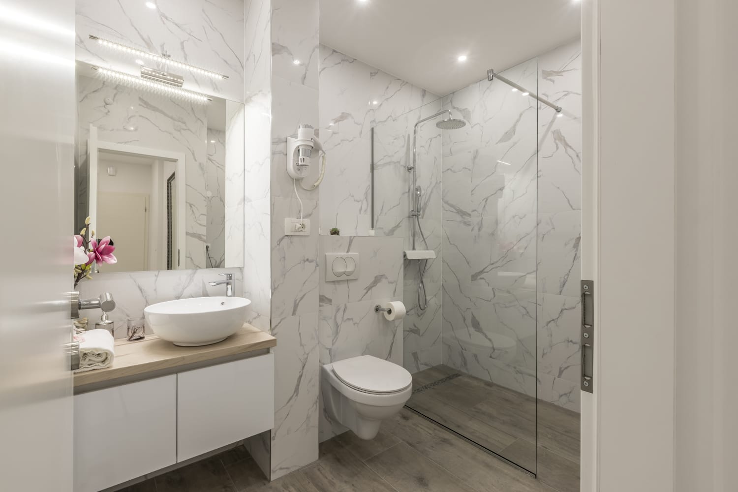 Marble bathroom with walk-in shower