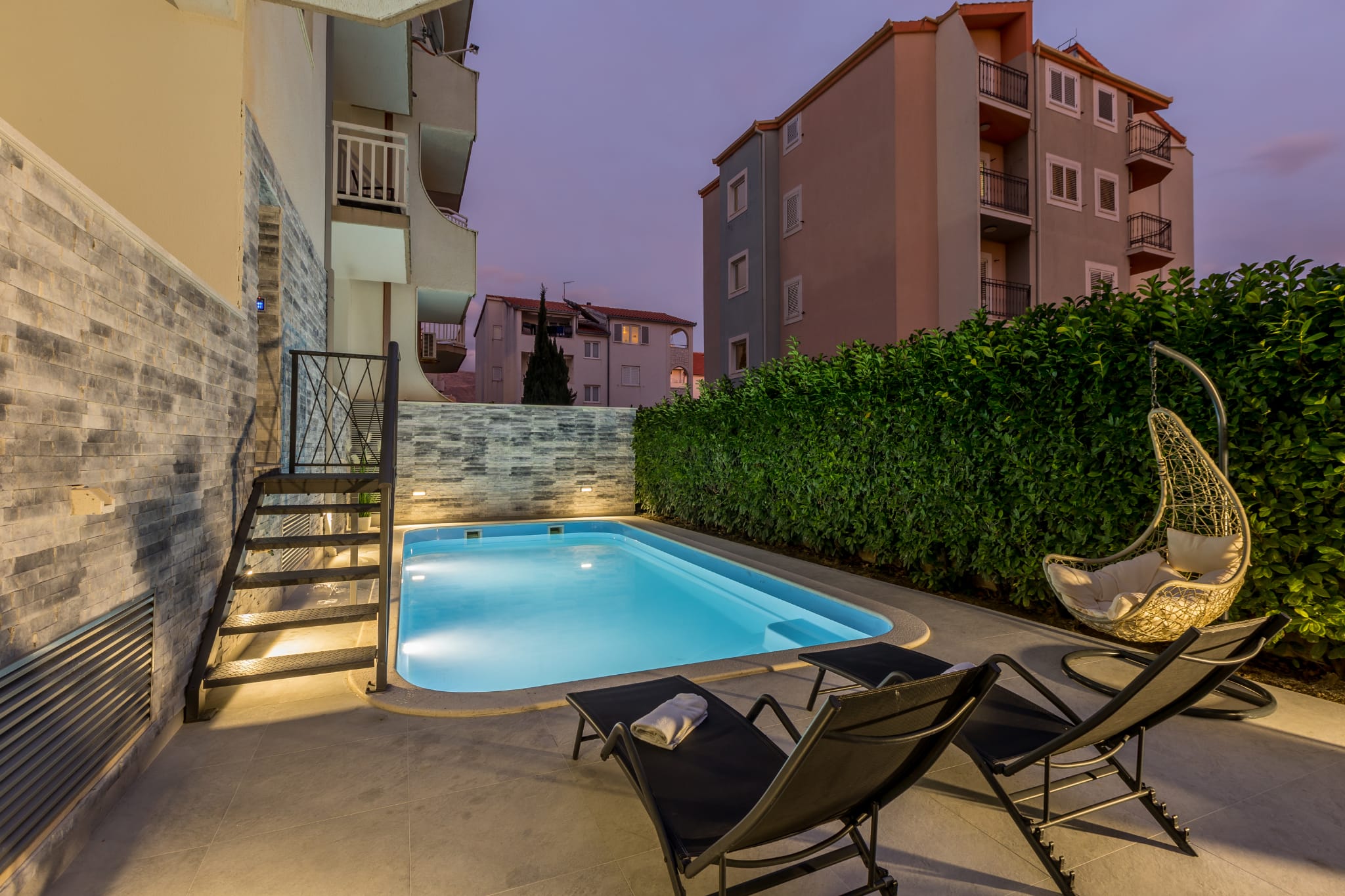 Pool with hanging chair